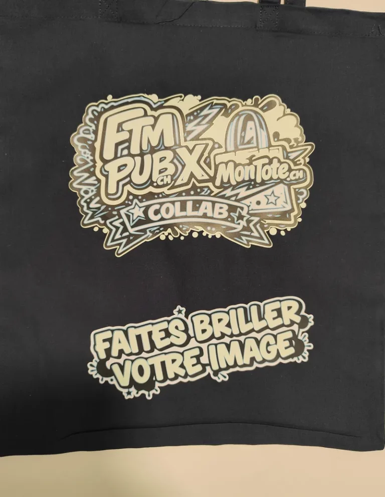 Tote bag noir collab FTMPub x MonTote.ch avec impression argentée — sac publicitaire fabriqué en Suisse, qualité locale